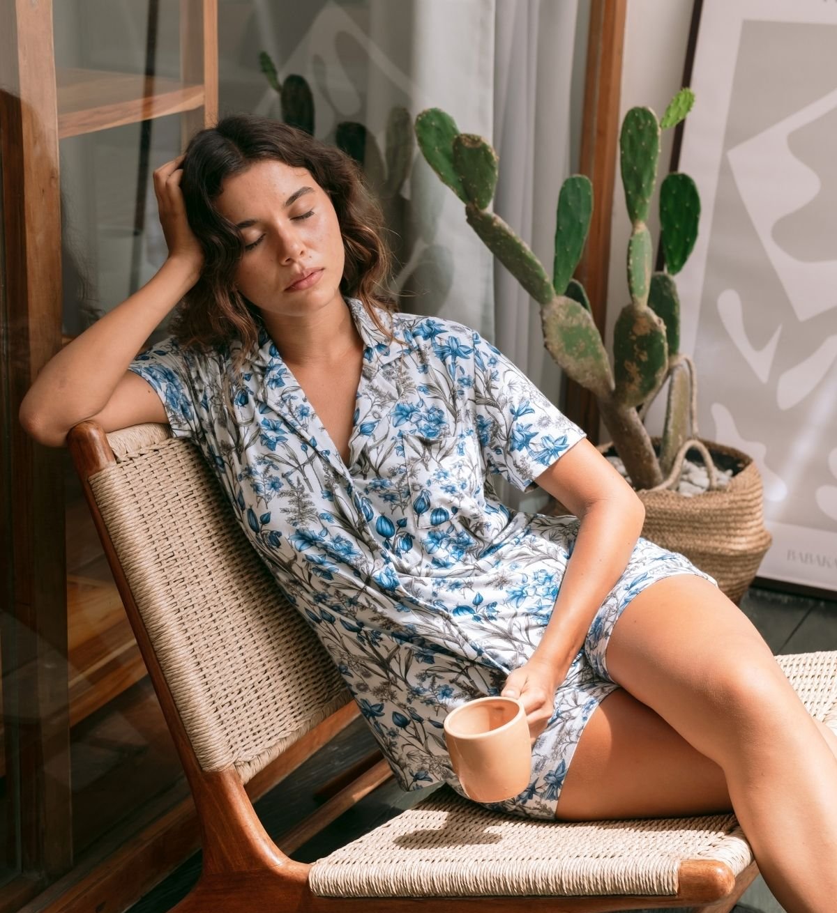 A model wearing a Slumber Games floral sleepwear set
